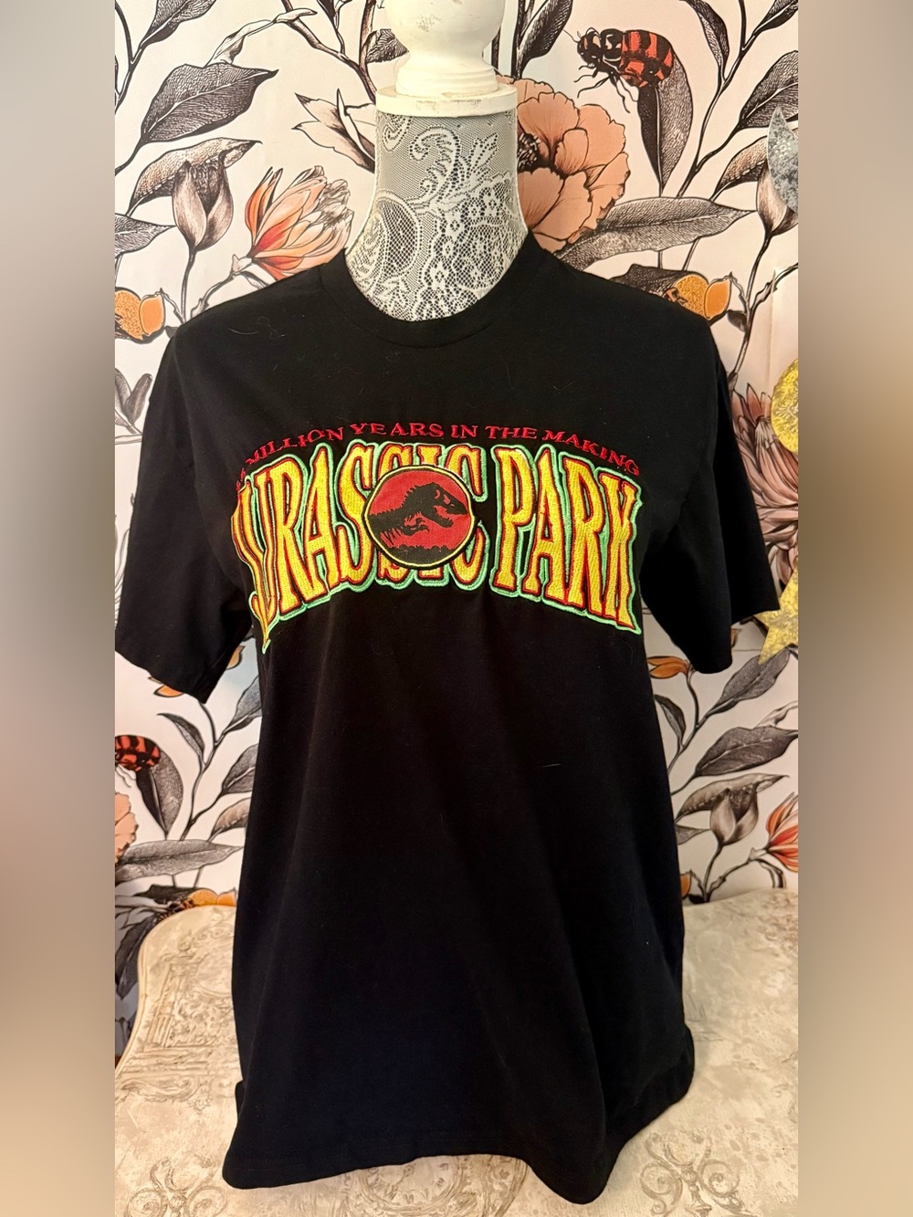 Jurassic Park Black Graphic Tee with Embroidered Red & Yellow Logo